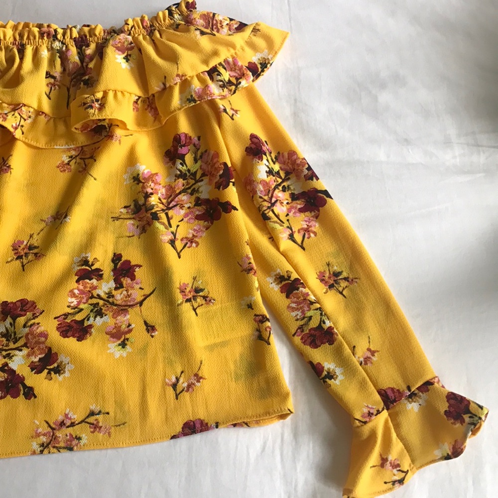 Off the shoulder blouse with ruffle sleeves